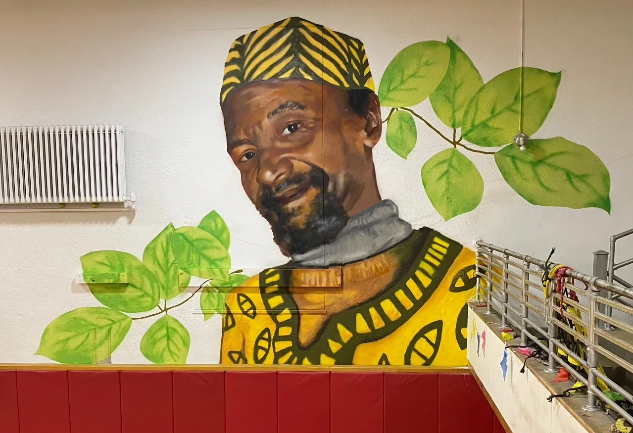 2023, spray and brush paint. Beverly J Martin Elementary School, Ithaca NY. Read more here: https://www.ithacamurals.com/bjm-legacy-mural.html